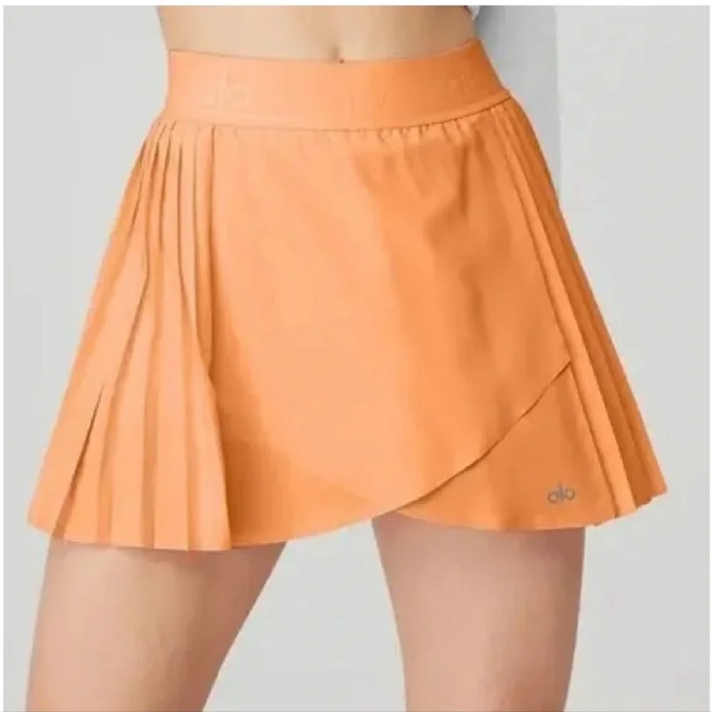 ALO Yoga Orange Pleated Athletic Skirt